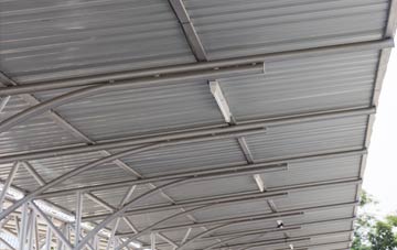 installing Milwich metal roofing